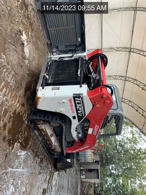 used takeuchi skid steer|takeuchi skid steer tl12v2 price.